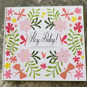 Kate Spade baby girl first year book, 40 pages, gold foil accent.